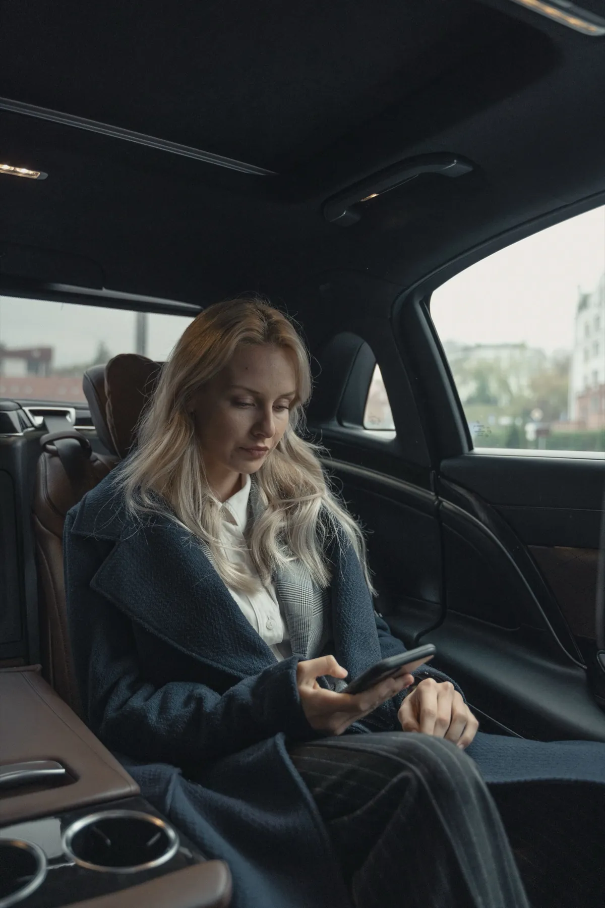 Passenger relaxing in the back seat